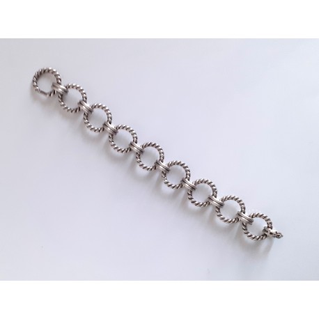 Important bracelet en métal argenté