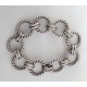 Important bracelet en métal argenté